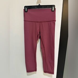 Lululemon Wunder Under High Rise Luon 21” leggings.